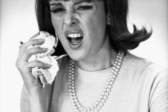 woman-sneezing image